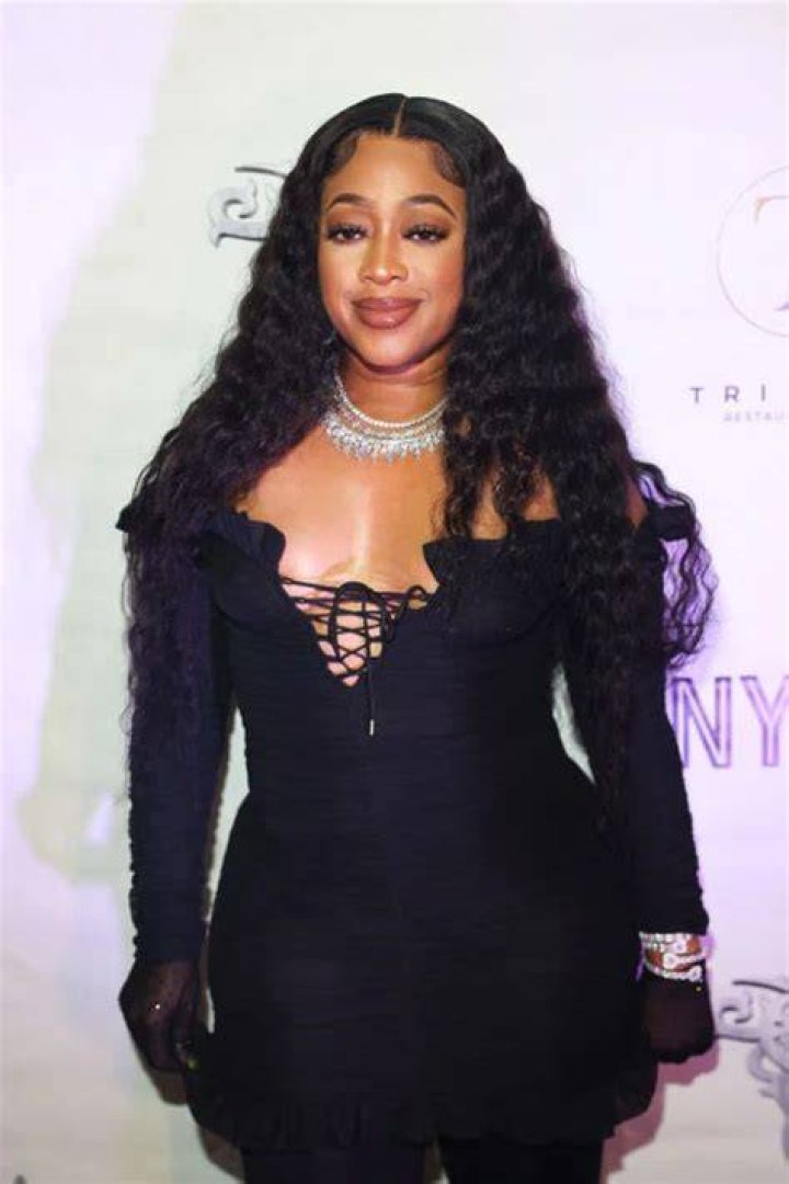 Trina (Rapper) - Age, Birthday, Bio, Facts, Family, Net Worth, Height & More