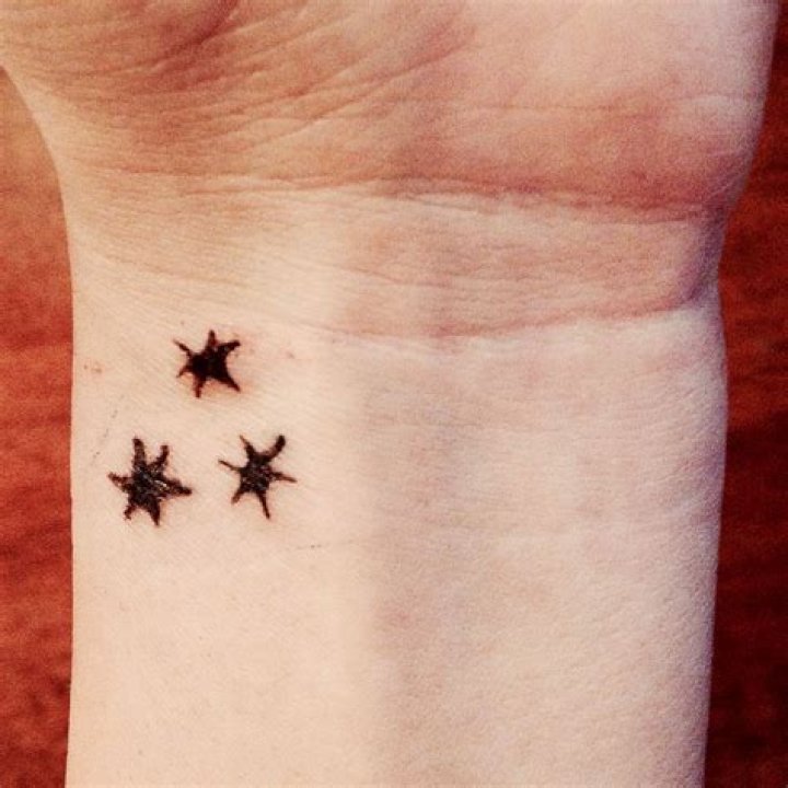What do the three stars in Harry Potter books mean?